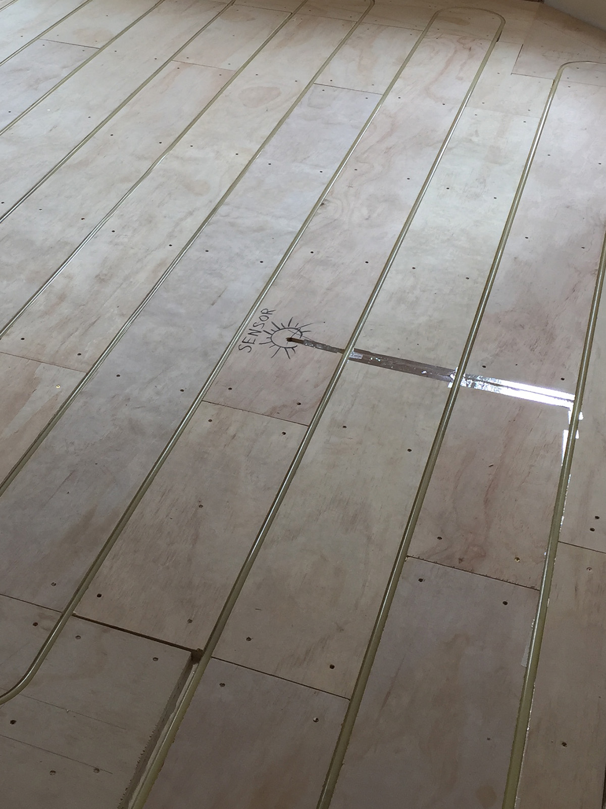 In floor radiant floor system in three story house